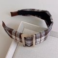 Close-up of a wide padded plaid headband with a brown marble resin buckle detail - Brown Beige Plaid Style (27367C)