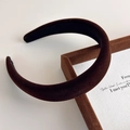 Macro view of dark brown velvet headband showing premium texture and anti-slip lining - Coffee