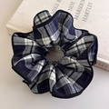 Close-up of blue tartan checkered oversized hair scrunchie with elegant black piped edges - Blue Plaid (27407A)