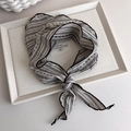Detailed texture of black and white striped scarf on minimalist cotton linen tray - Grey Stripe