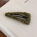 Close-up of olive green wool-wrapped triangle BB hair clip with textured yarn detail - Green