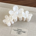 Close-up of cream-white floral acetate hair claw clip with elegant pearl luster finish - 5# Triple Flower Style (26837D White)
