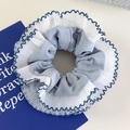 Detail of blue plaid scrunchie with double-layer white pleated lace trim hair tie - Blue Base (26844F)