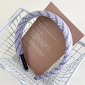 Detailed shot of purple plaid fabric headband with a black Hand Made woven label - 3cm Width Purple Plaid