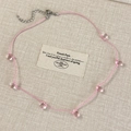Detail of pink cord necklace with clear water drop beads and metal lobster clasp - Pink Style (26932A) / Pink