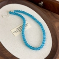 Dettaglio della collana di perline occhio di gatto blu con chiusura in metallo - Collana Grande di Perline Blu (27016C)