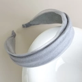 Close-up of light grey wide headband with textured layered fabric on white bowl - Gray Style (27047C)