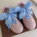Detailed close-up of pink suede sneakers featuring wide light blue satin ribbon shoelaces - 120cm / Blue Style (27051C)