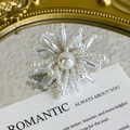 Detailed macro view of elegant pearl flower charms for DIY shoe buckle decoration - Creamy White Faux Pearl Radial Flower Style (27059-30)