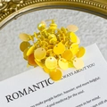Detailed macro view of sparkling yellow sequin beads and charms for DIY footwear decoration - Bright Yellow Sequin Cluster Style (27059-31)