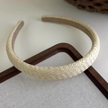 Detail of bohemian woven straw headband with beige texture and brown smooth inner lining - 4# 25583a