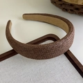 Close-up of brown straw woven headband showing natural texture and velvet inner lining - 27011C
