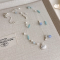 Details der blau melierten Muschelkette mit Silberanhänger und verstellbarem Verschluss - Hellblau Künstliche Perle Silberner Muschelanhänger Halskette (38# 26789A)