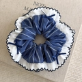Detail of blue striped scrunchie with ruffled edges and small navy ribbon bows - Blue and White Wide Stripe Round Style