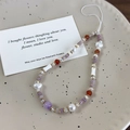 Detalle del colgante para móvil hecho a mano con perlas y piedras naturales finas - Cuentas Moradas (26493C)
