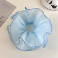 Close-up of light blue double-layered tulle scrunchie with ruffled organza edge textures - Blue Style (26598C)