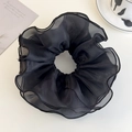 Close-up of black oversized mesh scrunchie with pleated layers and fine stitching detail - Black Style (26598D)