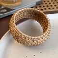 Detailed view of hand-woven rattan bracelet with intricate fiber texture and natural finish - Fine Woven Arc Style (26684D)