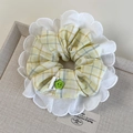 Detail of yellow checkered scrunchie with lace trim, green button, and Hand Made label - Yellow Round Style