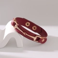 Verstellbares burgunderrotes Lederarmband mit Roségold-Trensenschnalle im Doppeldesign - Rot