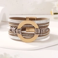 Bracciale multistrato in pelle con anello dorato e dettagli in strass lucidi - Argento