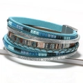 Bohemian multi-layer leather bracelet with cross charms and sky blue beaded wrap design - Blue