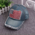 Detail of washed denim baseball cap with rhinestone American flag and studded brim trim - One Size / Light Blue Green Denim