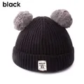 Berretto bimbo in maglia nera con due pompon grigi e etichetta Moonlight decorativa - Nero