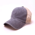 Detail view of the breathable beige mesh and washed grey cotton fabric on the baseball cap - Light Gray