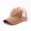 Distressed khaki mesh trucker hat featuring breathable washed cotton and a curved brim - Khaki