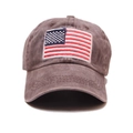 Close-up of vintage washed brown baseball cap featuring an embroidered American flag patch - Adjustable / Coffee