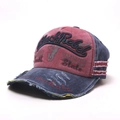 Detail of distressed washed cotton baseball cap with Black Rebel 3D embroidery - One Size / Burgundy