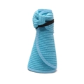 Detail of light blue straw sun hat showing compact foldable roll-up design with elastic band - One Size / Light Blue