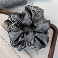 Detailed shot of silver-gray metallic scrunchie featuring elegant beaded bow accents - Silver Black (26205A)
