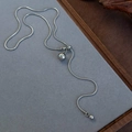 Detail of adjustable silver snake chain with polished metal spherical slide pendant - Silver Mirror Sliding Metal Ball Style (25978)