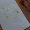 Detail of adjustable gold snake chain necklace with brown tiger eye bead and metal pendant - Golden Tiger Eye Bead Sliding Adjustable Style (26123)
