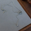 Detail of adjustable silver snake chain necklace with slider buckle on velvet display - Silver Minimalist Sliding Adjustable Ball Style (23254)