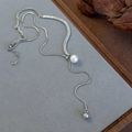 Detailed view of adjustable silver-tone Y-necklace with pearls and cubic zirconia chains - Silver Multi-Element Splicing Pearl Pendant Style (24517A)