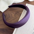 Macro detail of high-quality purple satin headband showing smooth texture and handmade label - Eggplant Purple