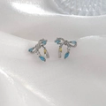 Boucles d'oreilles nœud en argent avec zircons bleus et accents de pierres fines - Argent avec Zirconia Bleu et Jaune