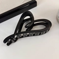 Detail of matte black heart hair claw clip with non-slip teeth for long hair - Matte Black Heart
