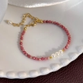 Close-up of pink faceted beads and white pearls with a golden lobster clasp and chain - Dark Pink Beads (25227B)