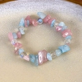 Detail of pink and light blue crushed stone beaded bracelet on a ceramic tray - Pink Blue Gravel Style (25402B)