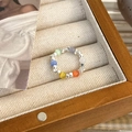 Close-up of colorful cat-eye beads and silver-tone metal spacers on a stretch ring - Cat's Eye Style (23738B)
