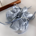 Close-up of silver blue pleated scrunchie with faux pearls and ribbon bow detailing - Blue Style (25607B)