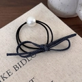 Close-up of blue denim bow hair tie with pearl detail on high elastic black double bands - Dark Blue Hair Tie Style (25628D)