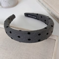 Detail of grey sponge headband with black polka dots and a handmade label interior - Gray Polka Dot