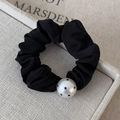 Detailed shot of black pleated silk hair scrunchie with a vintage polka dot bead accent - Large Pearl Style (25778B) / Black