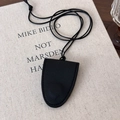 Detail of black leather bell-shaped charm with precise stitching and lychee texture - Bell-shaped / Black Style (25757B)