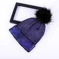 Women's winter thick knit beanie with gold-flecked blue yarn and faux fur pom-pom detail - Adult / Blue